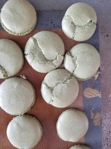 matcha macarons with cracked tops 