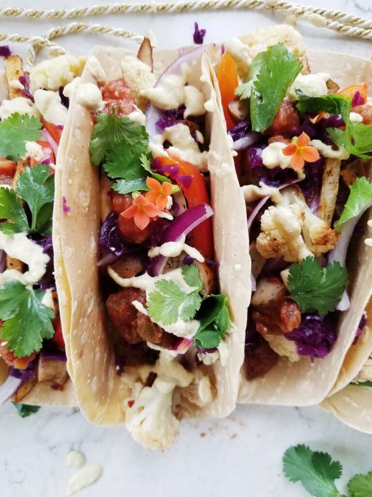 close up of rainbow chicken sausage tacos 