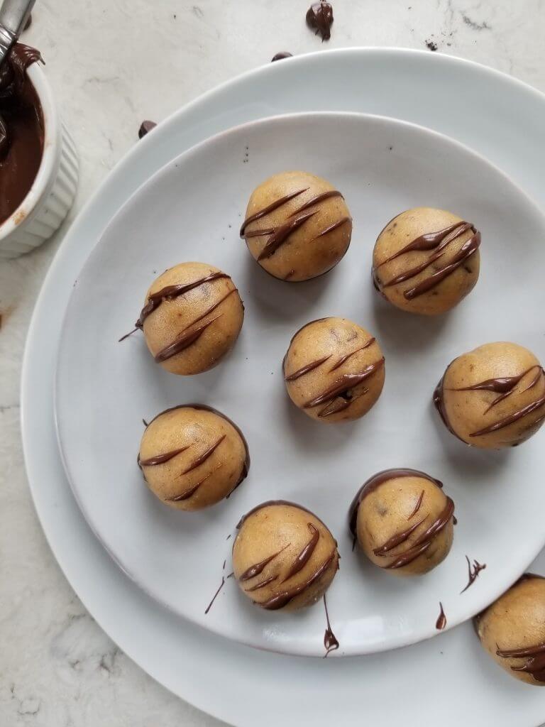 Edible No-bake Reese's Cookie Dough Recipe with melted chocolate drizzled across the top