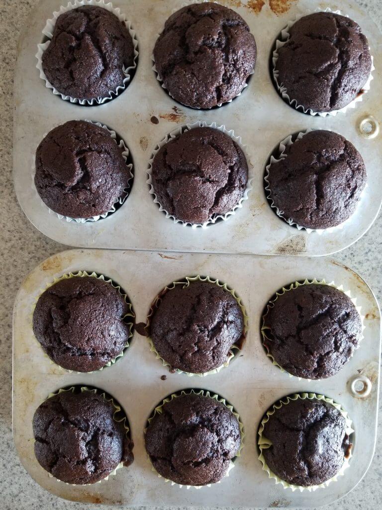 banana chocolate muffins after baking with cracked tops