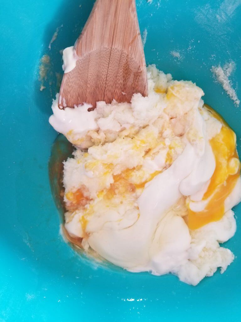 bowl of butter, vanilla yogurt, sugar, egg, and vanilla extract