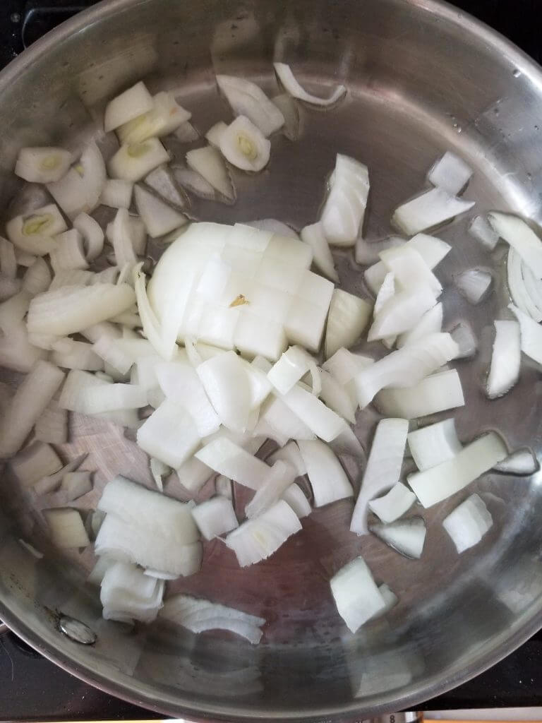 Diced onions in a pan with oil