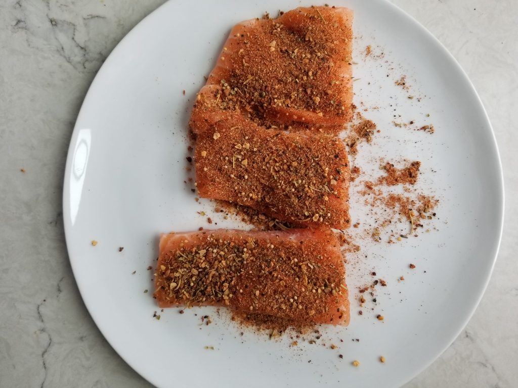 Seasoned salmon before cooking