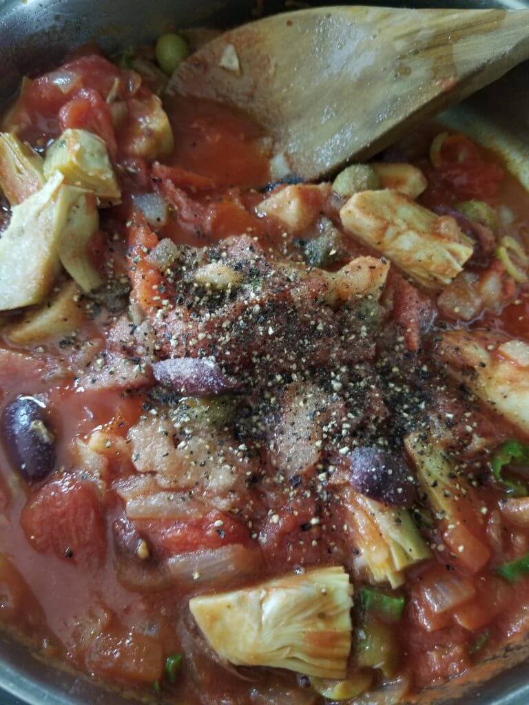 tomato artichoke sauce seasoned with salt and pepper