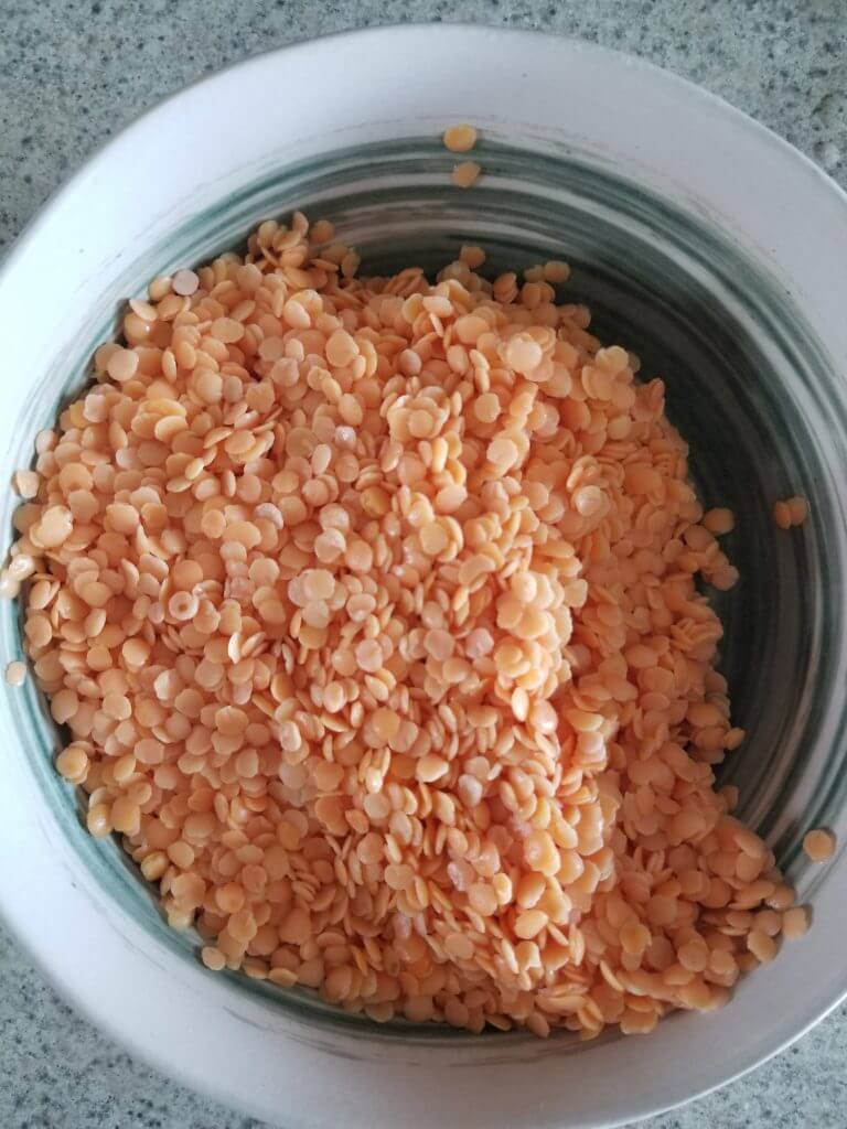 Rinsed red lentils in a bowl