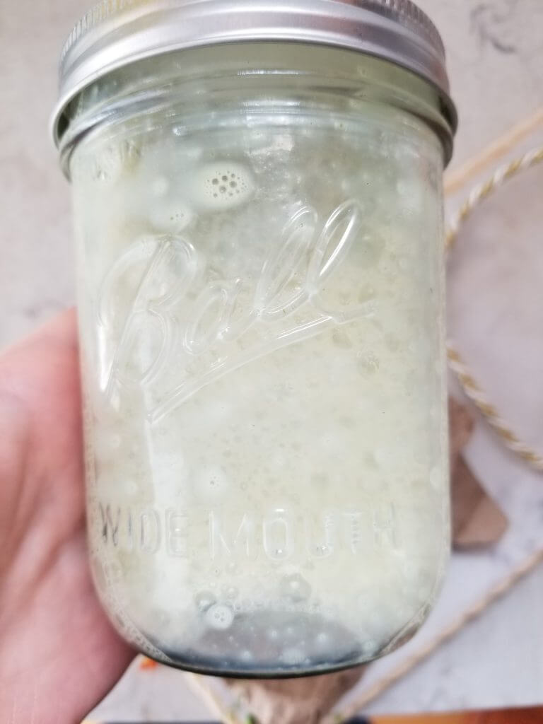 iced matcha latte in a mason jar 