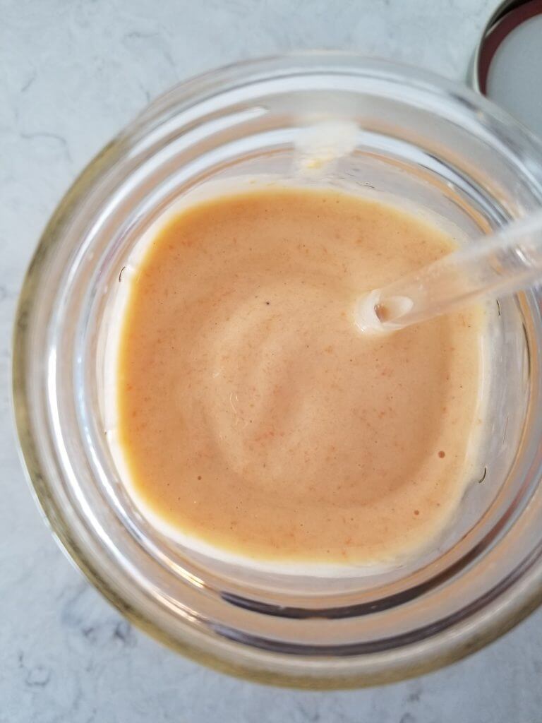 shot from the top of the vegan carrot orange protein smoothie 