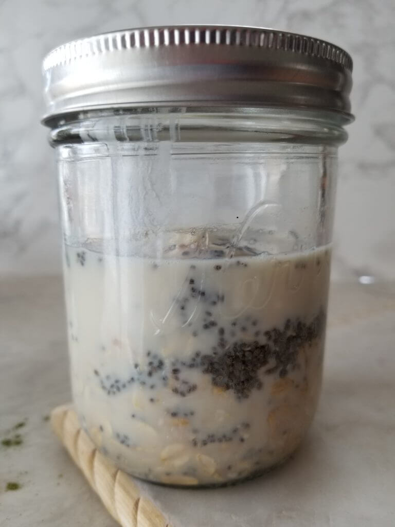 rolled oats, milk, chia seeds, and yogurt in a mason jar