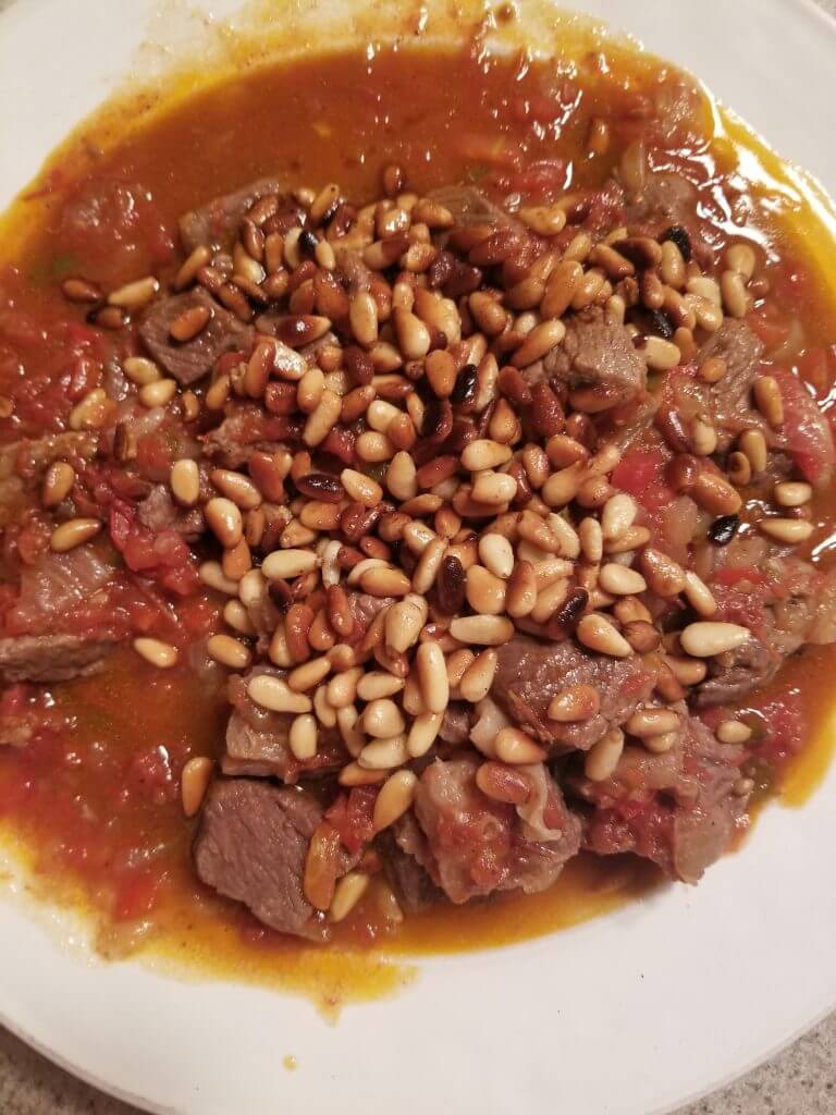 galayet bandora with toasted pine nuts on top