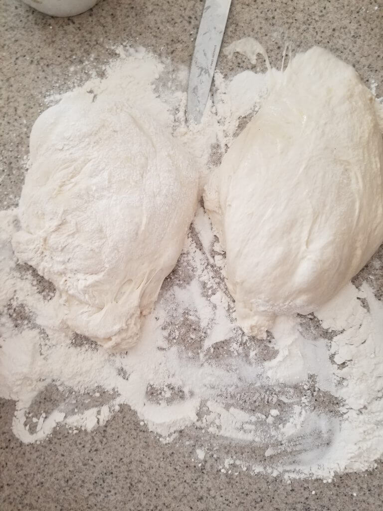 ciabatta bread dough cut in half