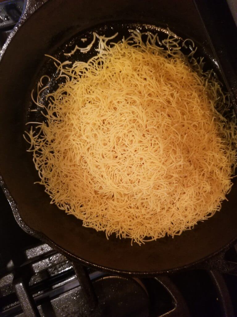 toasting vermecelle noodles in a cast iron skillet
