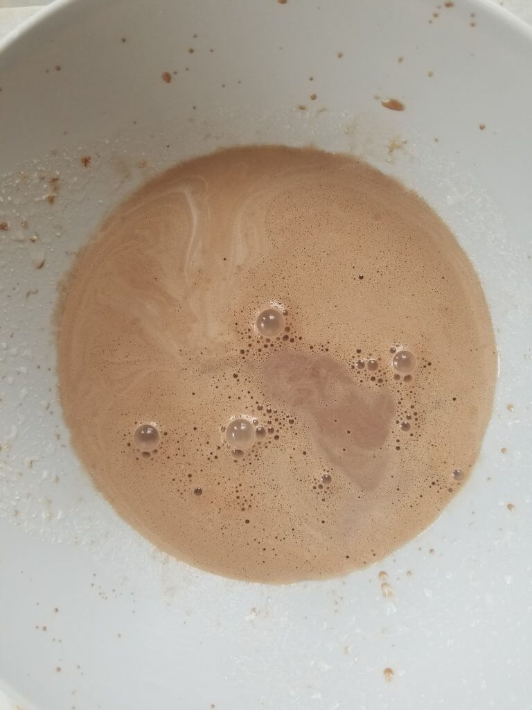 chocolate almond milk in a bowl 
