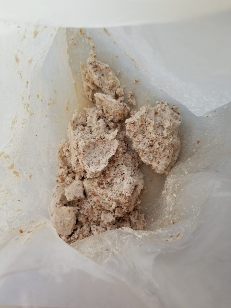 almond pulp in an almond milk bag 