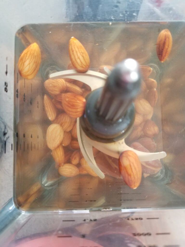 almonds and almond milk ingredients in the blender